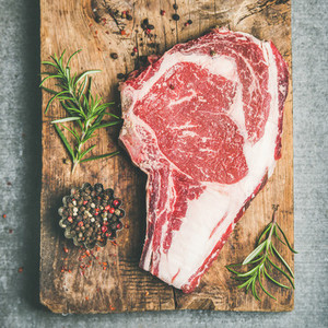 Raw prime beef meat dry aged steak rib eye square crop