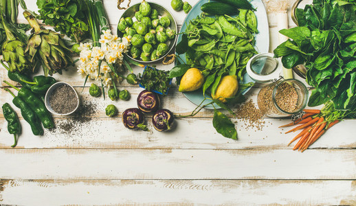 Spring healthy vegan food cooking ingredients top view copy space