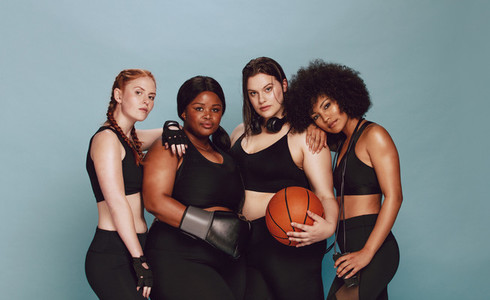 Diverse group of women with sports equipment