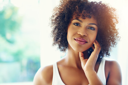 Pretty afro american woman smiling at camera