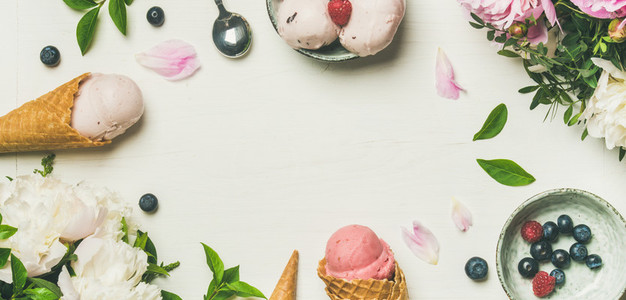 Flat lay of ice cream scoops and peonies  wide composition