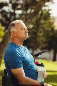 Portrait of a senior fitness person relaxing