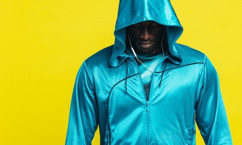 African man in a fitness hoodie
