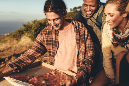 Group of hiker having pizza