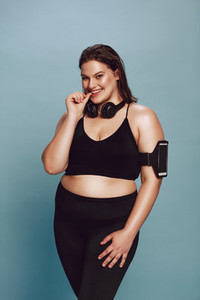 Oversized woman posing in sports clothing