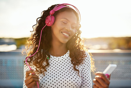 Girl in pink headphones
