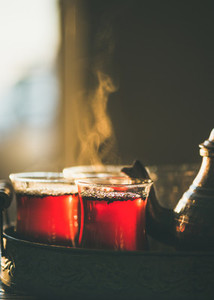Freshly brewed black tea in turkish glasses   close up