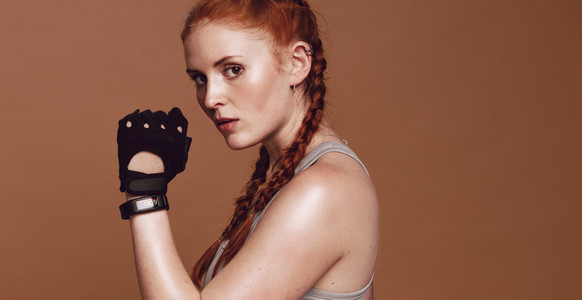 Female with gloves ready for boxing workout