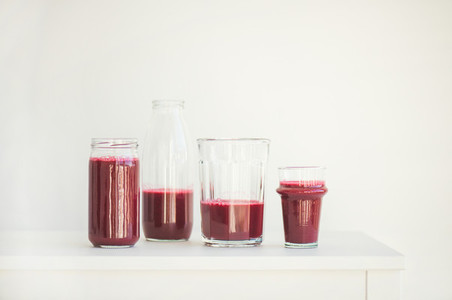Fresh morning beetroot smoothie or juice in glasses  copy space