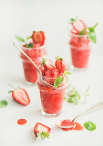 Strawberry and champaigne summer granita in glasses with mint