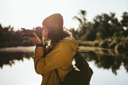 Tourist capturing the beauty of nature in camera