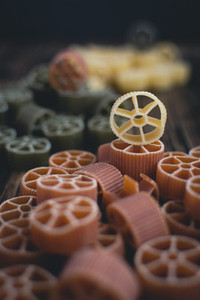 Wheel pasta detail on a wooden