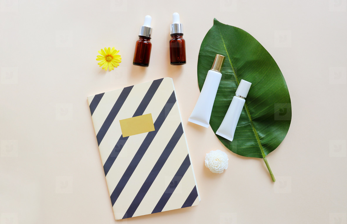 Flat lay of various organic skincare and beauty products for moc