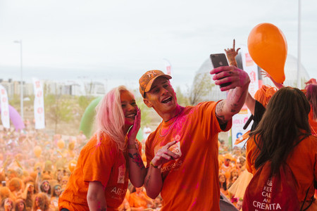 March 31  2019   Madrid  Spain   Aliexpress  celebrating its 9th anniversary with a colorful holi run in Valdebebas  Madrid  Spain
