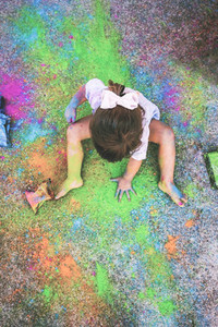 Little girl dirty of paint
