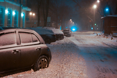 Snow covered night street