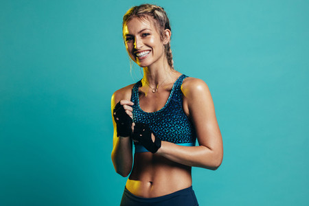 Smiling female fitness model