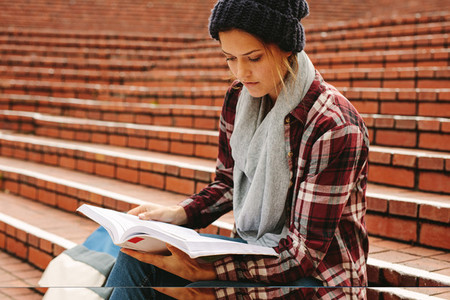 Female teenager studying in campus
