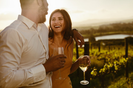 Couple on a romantic date in a vineyard