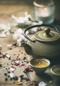 Traditional Asian tea ceremony arrangement over rustic background