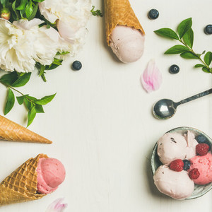 Flat lay of ice cream scoops and peonies  square crop
