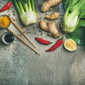 Flat lay of Asian cuisine ingredients over concrete background  square crop