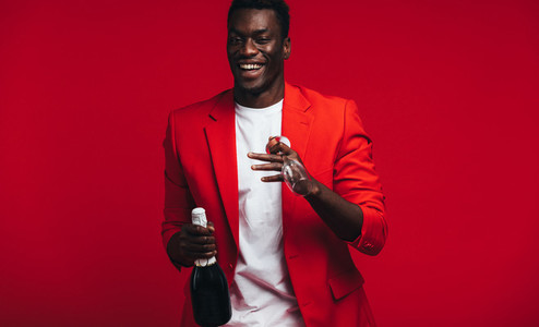 Cheerful man with champagne