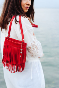 beautiful young girl with a handbag