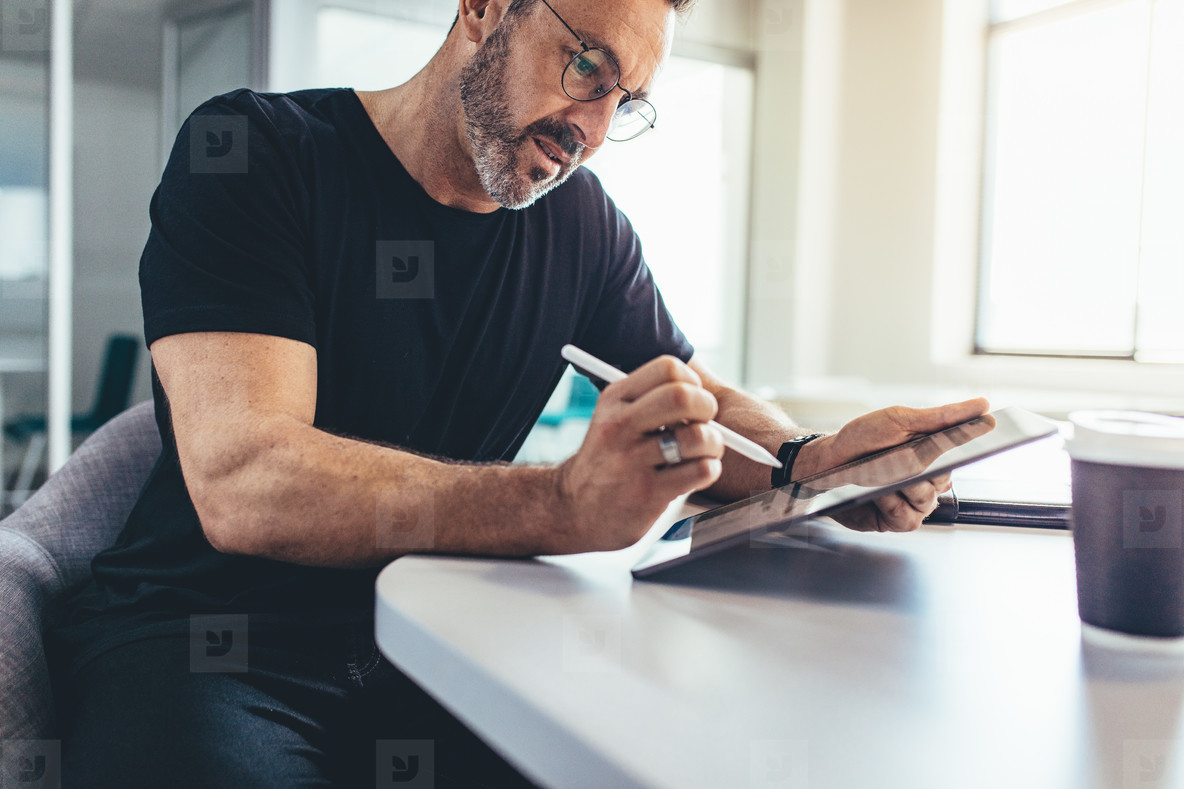 Male entrepreneur checking emails