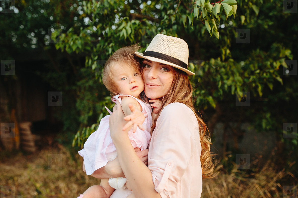 mother and daughter together outdoors