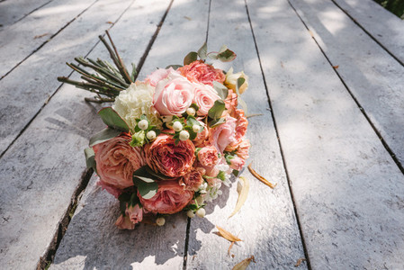 wedding bouquet on the wooden floor