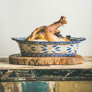 Roasted whole chicken for Christmas eve celebration table  square crop