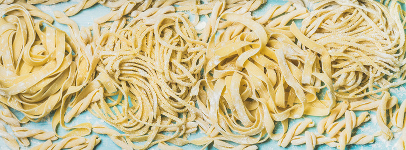 Italian pasta on blue background