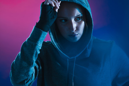Woman in hoodie after training session