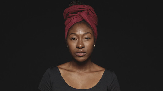 Portrait of an african woman in a headwrap