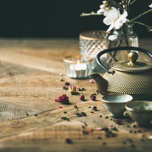 Traditional Asian tea ceremony arrangement over wooden background  square crop