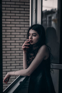 Beautiful girl smokes