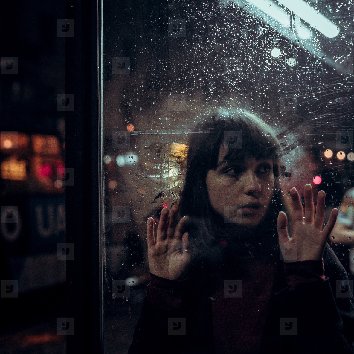 sad girl behind rain glass on night city background stock photo (172072) -  YouWorkForThem