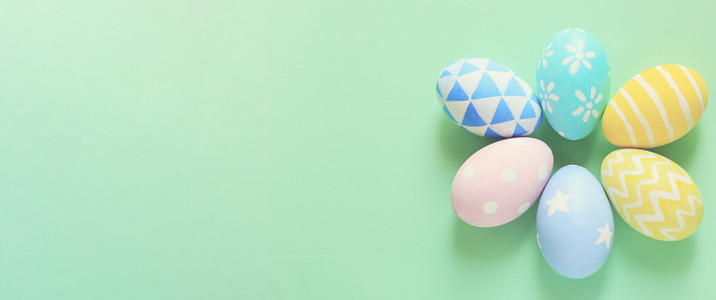Pastel and colorful easter eggs with copy space