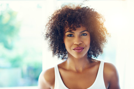 Beautiful young black woman with frizzy Afro hair