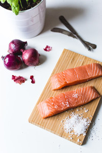 Raw salmon fillets prepared