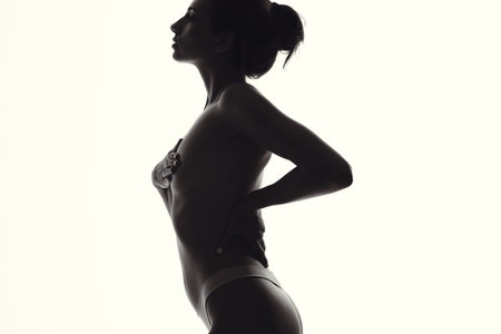 Silhouette of woman with slim body