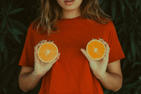 Girl and oranges