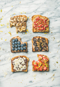 Healthy breakfast or snack with wholegrain toasts top view
