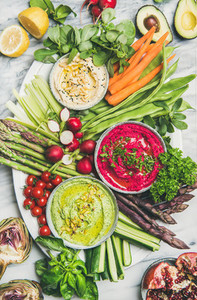 Healthy summer vegan snack plate over marble background