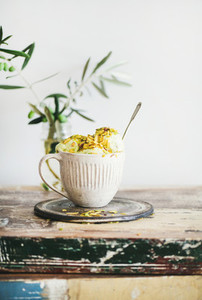 Bowl of homemade pistachio ice cream dessert in mug