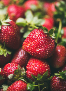Fresh strawberry texture wallpaper and background selective focus