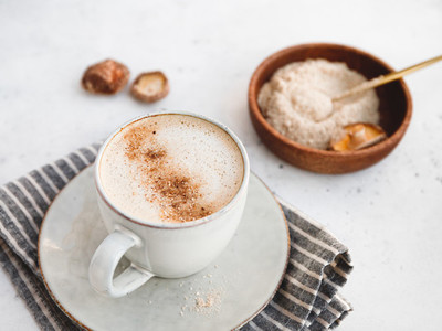 Mushroom latte with shiitake powder and unsweetened coconut almond blend milk  Healthy useful vegan drink