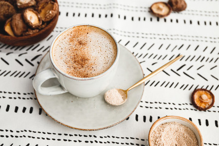Mushroom latte with Shiitake powder and unsweetened coconut almond blend milk  Healthy useful vegan drink