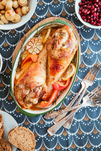 Festive dish for Thanksgiving  roasted turkey legs with vegetables on a table with snacks  Top view  flat lay